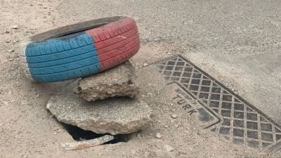 Kurtalan’da Hasarlı Logar Kapağına Lastikli Önlem